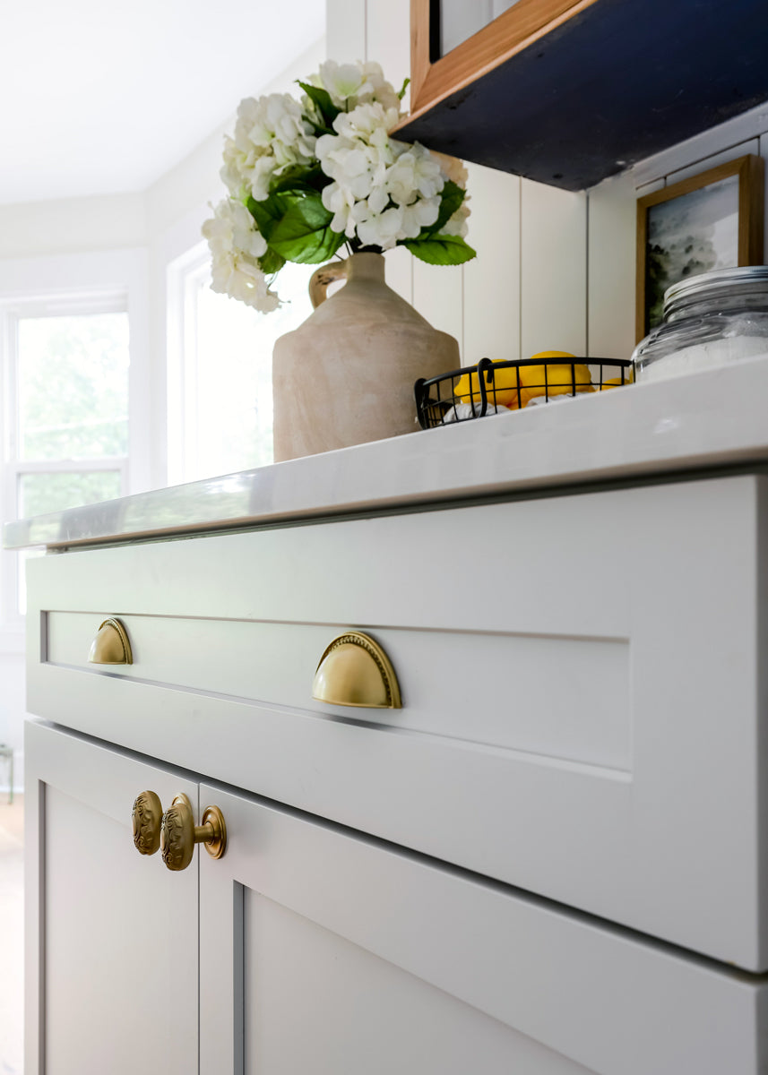 white kitchen cabinets brass cabinet hardware